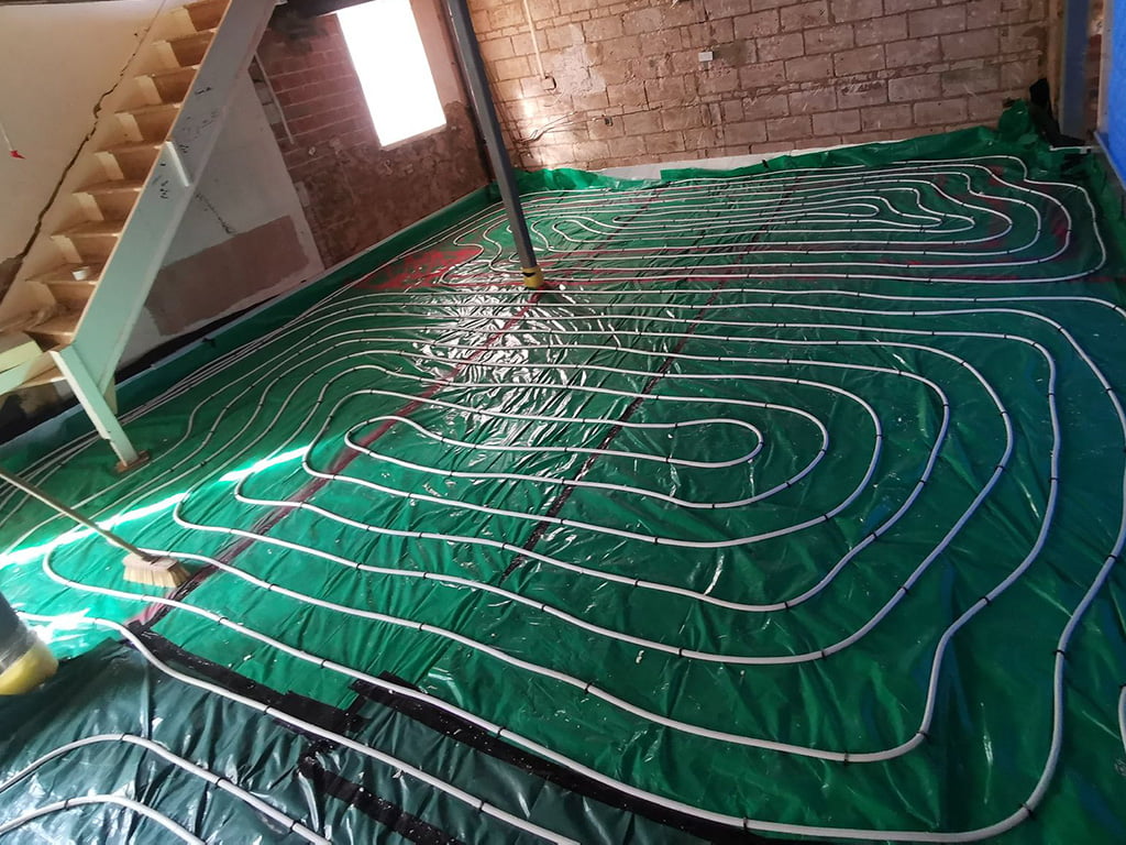 Quality Liquid screed Swansea Underfloor heating 01933 716018